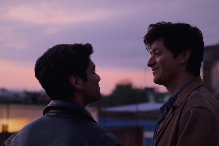Christian Vázquez as Gerardo and Armando Espitia as Iván in <em>I Carry You with Me.</em>