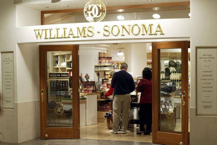 Shoppers browse at a Williams Sonoma in Chicago, Ill., on May 22, 2003.