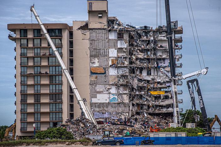 Search and Rescue teams look for survivors in the partially collapsed 12-story Champlain Towers South condo building on June 30, 2021 in Surfside, Fla. Four more bodies were found on Wednesday.