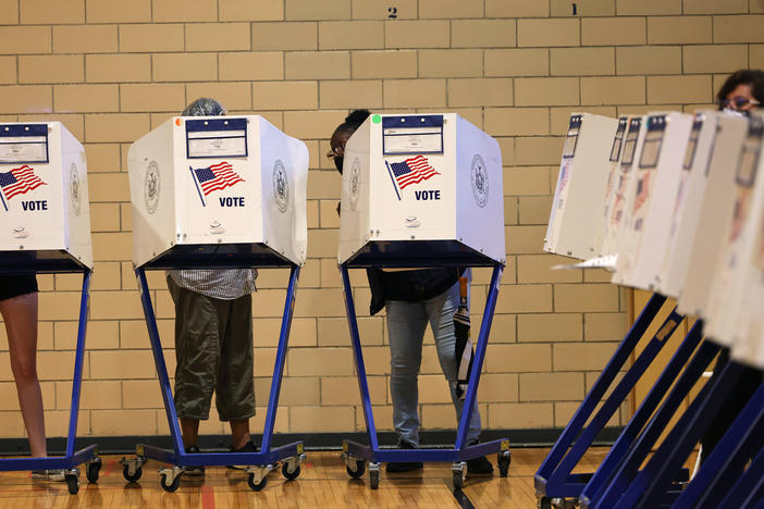 People vote during the Primary Election Day at P.S. 249 The Caton School on June 22 in the Flatbush neighborhood of Brooklyn borough in New York City.