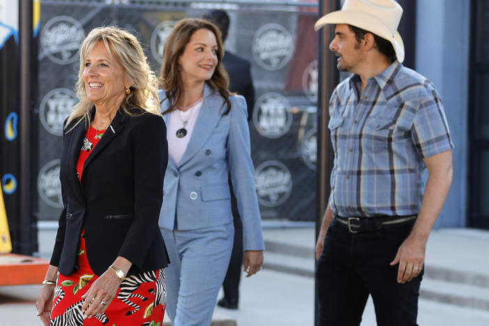 First lady Jill Biden tours a vaccination site in Nashville with country star Brad Paisley and his wife Kimberly Williams-Paisley.