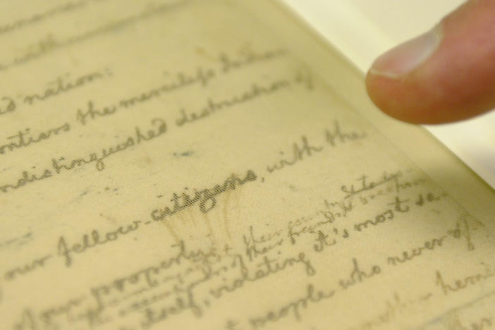 Librarian of Congress James Billington points to a correction in the rough draft of the Declaration of Independence written by Thomas Jefferson, on July 2, 2010, at the Library of Congress in Washington. Imaging of the document confirmed that Jefferson originally wrote "subject" then changed it to "citizen."