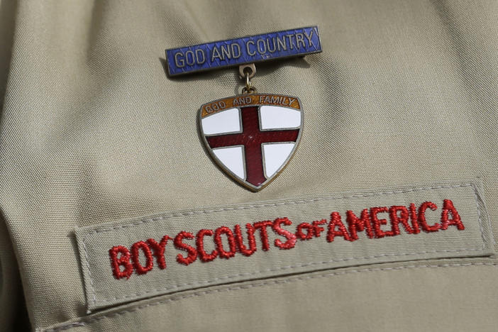 The Boy Scouts of America has reached a settlement with scores of men who say they were abused while they were in scouting. The deal has been presented to a federal court hearing the Boy Scouts' bankruptcy case.