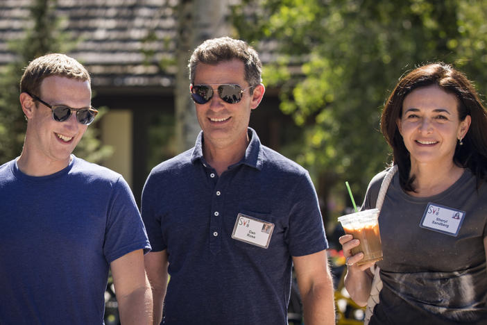 Facebook's CEO Mark Zuckerberg, Vice President of Partnerships Dan Rose and Chief Operating Officer Sheryl Sandberg walk together at the Allen & Company Sun Valley Conference on July 12, 2018 in Sun Valley, Idaho. Top tech and media moguls descend on the resort every year for a week of activities - and deals.