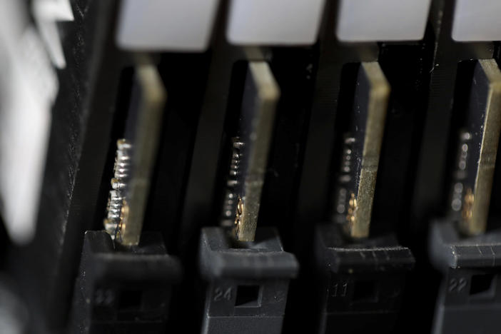 This file photo shows the inside of a computer in Jersey City, N.J. Cybersecurity teams worked feverishly Sunday, July 4, to stem the impact of the single biggest global ransomware attack on record, with some details emerging about how the Russia-linked gang responsible breached the company whose software was the conduit.