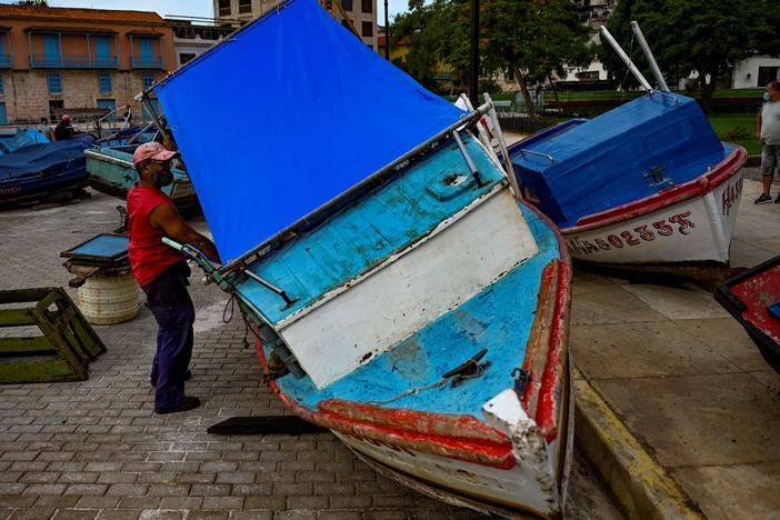 Fishermen secure their boats to land ahead of the passage of Tropical Storm Elsa in Havana, Cuba, on July 5. Elsa made landfall in Cuba and is now headed to Florida.