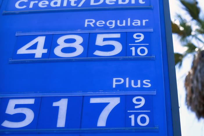 Gas prices are displayed at a Chevron station on June 14 in Los Angeles. A meeting of the oil cartel known as OPEC+ ended in drama, leading to intense volatility in crude prices.