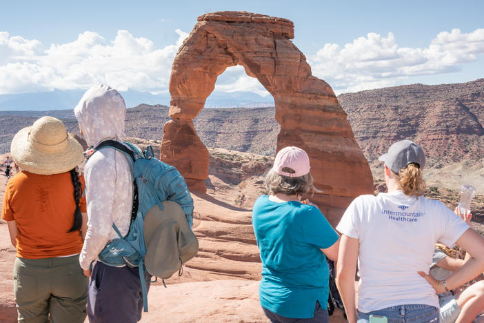 Visitors gather last week to view Delicate Arch at Arches National Park in Utah.