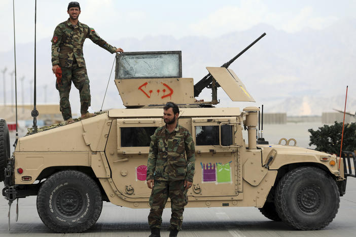 Afghan soldiers stand guard after the American military left the Bagram Airfield, north of Kabul, on July 5. While the U.S. military is now largely gone from Afghanistan, the CIA is still monitoring the Taliban and developments in the country, though under much more difficult circumstances.