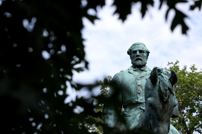 A statue of Confederate Gen. Robert E. Lee is shown in Market Street Park July 9, 2021 in Charlottesville, Va. The statute, along with another of Gen. Stonewall Jackson, will be removed Saturday.