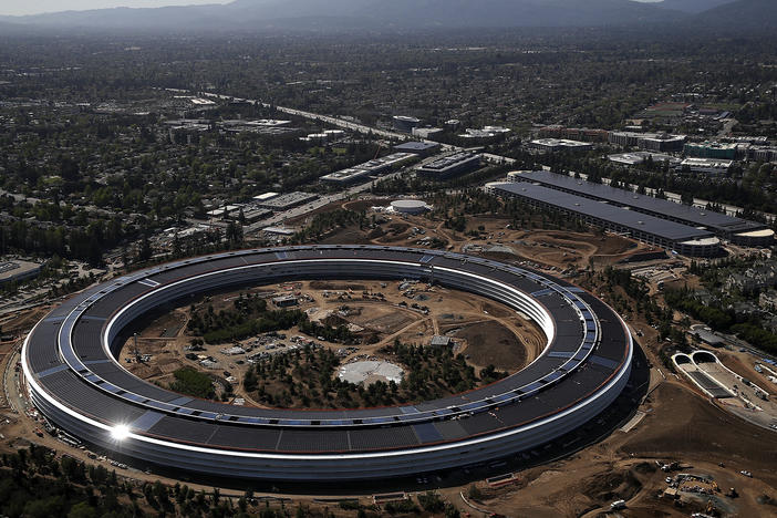 Apple's massive" spaceship" campus designed to centralize work and foster collaboration in 2017 may have to make way for satellite offices and other remote work.