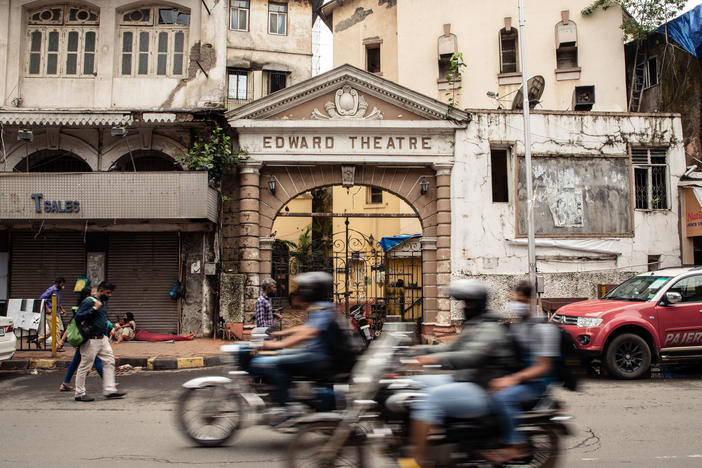 Edward Theatre's entrance, as seen from the street opened in 1914 in Kalbadevi, and was named after King Edward V, who visited Mumbai the same year. It initially started with stage plays, with a total of 509 wooden seats, distributed between three separate levels. Until a few years ago, the theatre turned cinema hall, played mostly B- grade Bollywood films.