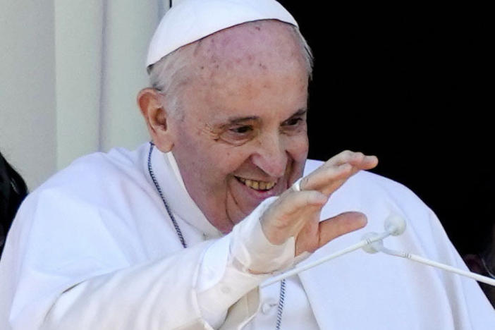 Pope Francis appears on a balcony of the Agostino Gemelli Polyclinic in Rome, where he was recovering from intestinal surgery, for the traditional Sunday blessing and Angelus prayer on July 11, 2021. Pope Francis left the hospital Wednesday to continue his convalescence at the Vatican.