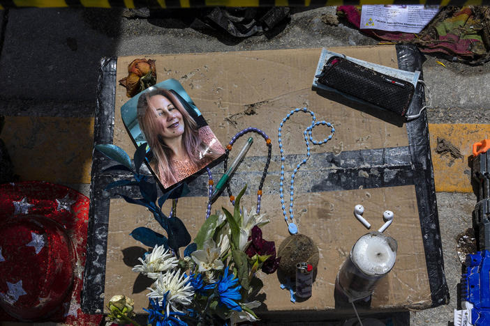 A memorial contains personal items of some of the missing from the collapsed Champlain Towers South in Surfside, Fla.