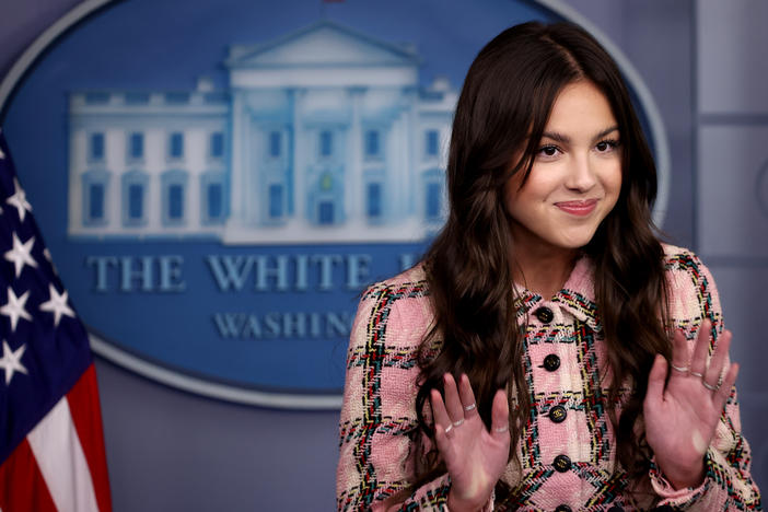 Pop star Olivia Rodrigo makes a brief statement to reporters Wednesday in the Brady Press Briefing Room at the White House.