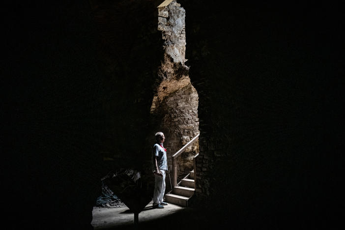 Archaeologist Ferudun Ozgumus stands in what is believed to be a Byzantine-era substructure in Istanbul.