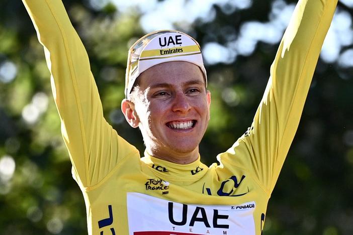 Tadej Pogačar of Slovenia celebrates in Paris after claiming his second Tour de France victory in a row on Sunday.