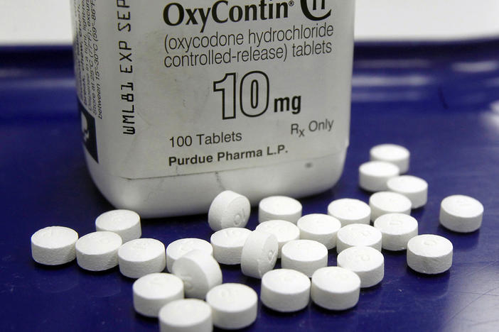 A 2013 file photo shows OxyContin pills at a pharmacy in Montpelier, Vt.