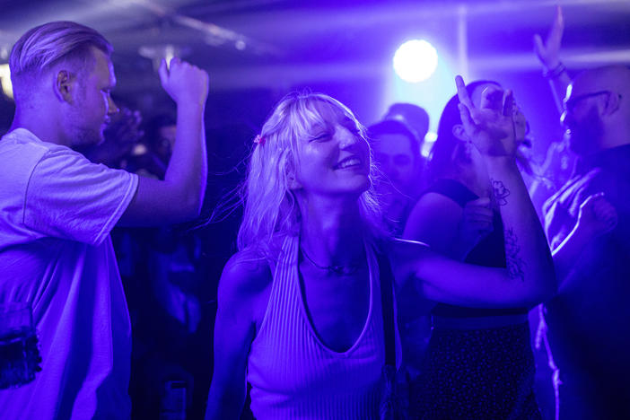 People dance at Egg London nightclub early Monday in the British capital.