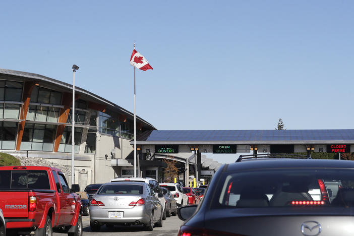 Traffic enters Canada from the United States at the Peace Arch Border Crossing in Blaine, Wash., in 2019. Vaccinated Americans will be able to travel to Canada, starting Aug. 9.