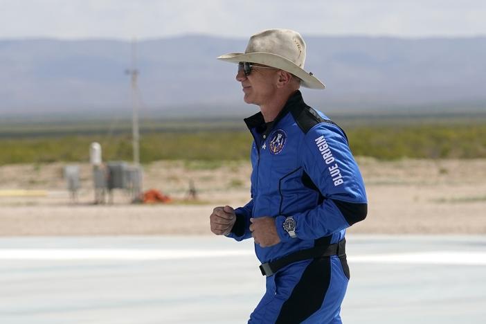 Jeff Bezos, founder of Amazon and space tourism company Blue Origin, jogs onto his rocket landing pad ahead of his trip to the edge of space on Tuesday. When top executives like Bezos have dangerous hobbies, there's often little company boards can do.