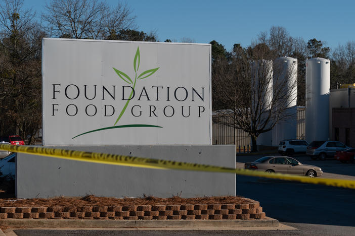 Tanks of liquid nitrogen are seen at the Foundation Food Group poultry processing plant in Gainesville, Ga. Six workers died after a freezer malfunctioned in January 2021.