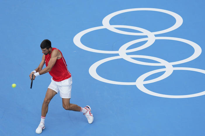 Serbia's Novak Djokovic practices for the men's tennis competition on Thursday at the Summer Olympics.