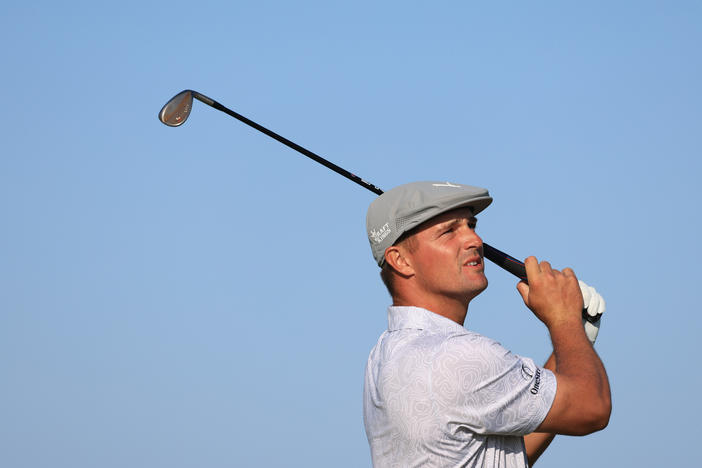 Bryson DeChambeau of the United States tested positive for the coronavirus before leaving the U.S. for the Tokyo Olympics. He's shown here earlier this month playing at the Open Championship in Scotland.