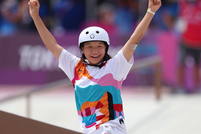 Momiji Nishiya of Team Japan celebrates during the Women's Street Final on day three of the Tokyo 2020 Olympic Games on Monday at Ariake Urban Sports Park.