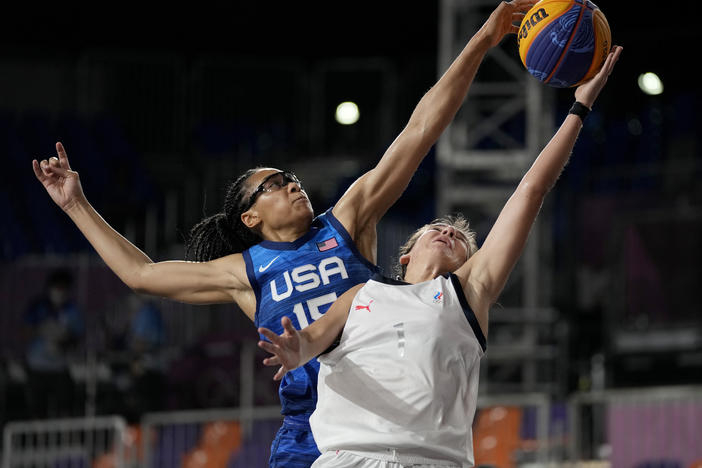 U.S. player Allisha Gray blocks a shot by Yulia Kozik from Russia on Sunday during a women's 3-on-3 basketball game at the 2020 Summer Olympics in Tokyo.