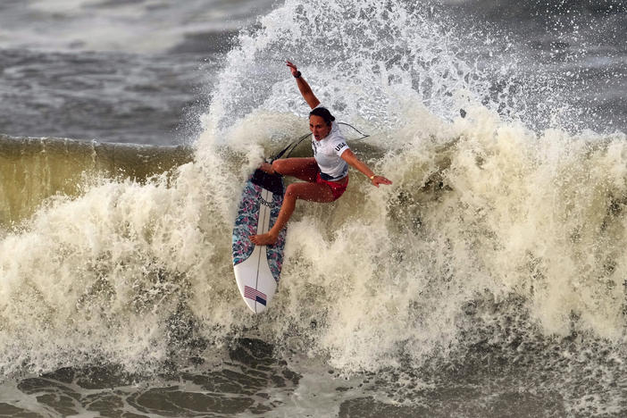 Carissa Moore from the U.S. performs on the wave during the gold medal heat in the women's surfing competition at the Summer Olympics on Tuesday in Ichinomiya, Japan.