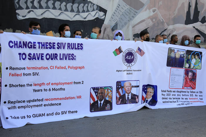 Former Afghan interpreters demonstrate in June outside the U.S. Embassy in Kabul. They called for the Biden administration to modify the rules and speed up the processing of U.S. visas that have been promised to Afghans who worked for the U.S. military over the past two decades. The visas are known as Special Immigrant Visas, or SIVs.