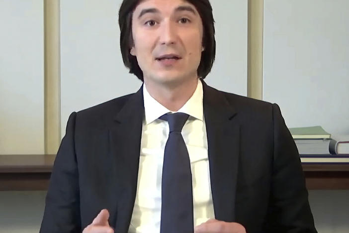 In this image from video provided by the House Financial Services Committee, Vlad Tenev, chief executive officer of Robinhood, testifies during a virtual hearing on GameStop in Washington, D.C., on Feb. 18. Robinhood is facing a range of lawsuits and potential regulary action as it gears up to make its Wall Street debut.