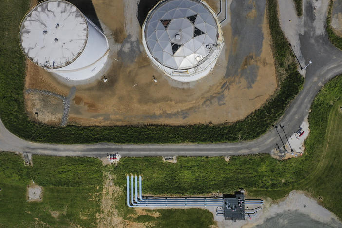 Fuel holding tanks are pictured at Colonial Pipeline's Dorsey Junction Station in Woodbine, Maryland in May 2021, the month that a cyberattack disrupted gas supply to the eastern U.S. for several days.