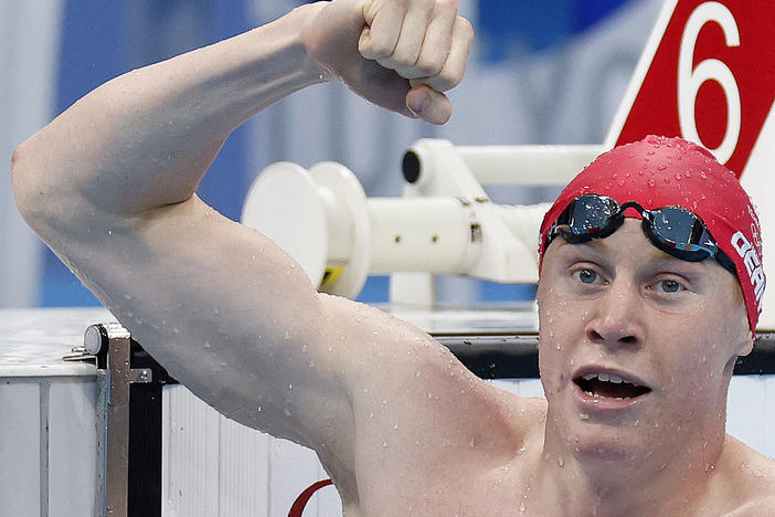 Britain's Tom Dean celebrates winning gold in the men's 200-meter freestyle swimming event at the Tokyo Olympics on Tuesday.