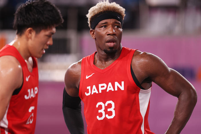 Ira Brown of Team Japan looks on during the Men's Pool Round match between Latvia and Japan on Sunday at the Tokyo 2020 Olympic Games. "It's an honor to be Japanese," he said.
