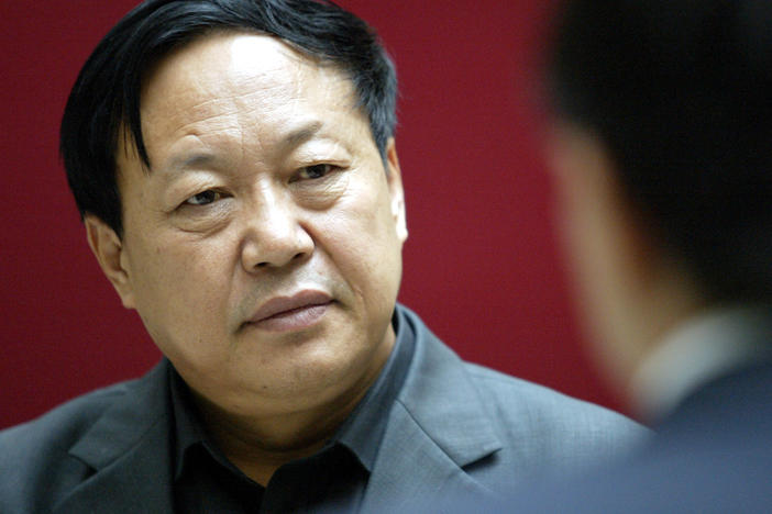 Sun Dawu, shown here in 2005, was sentenced Wednesday in a court in China's Hebei province. The billionaire pig farmer was found guilty of eight charges, including gathering crowds to attack state agencies, illegal fundraising and "provoking trouble."