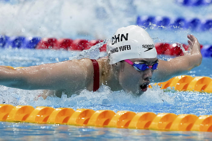 Zhang Yufei of China swims toward an Olympic record and gold medal in the women's 200-meter butterfly final at the Tokyo Olympics.