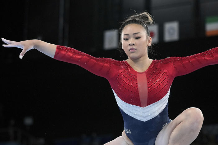 Sunisa Lee, of the United States, performs on the balance beam during the artistic gymnastics women's final at the 2020 Summer Olympics, Tuesday, July 27, 2021, in Tokyo.