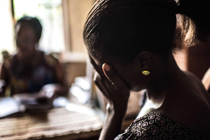 Counseling a newly diagnosed HIV patient in Kinshasa, Democratic Republic of Congo.