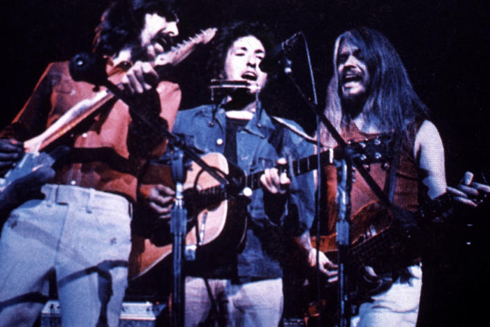 George Harrison, Bob Dylan and Leon Russell perform at the Concert for Bangladesh in 1971.