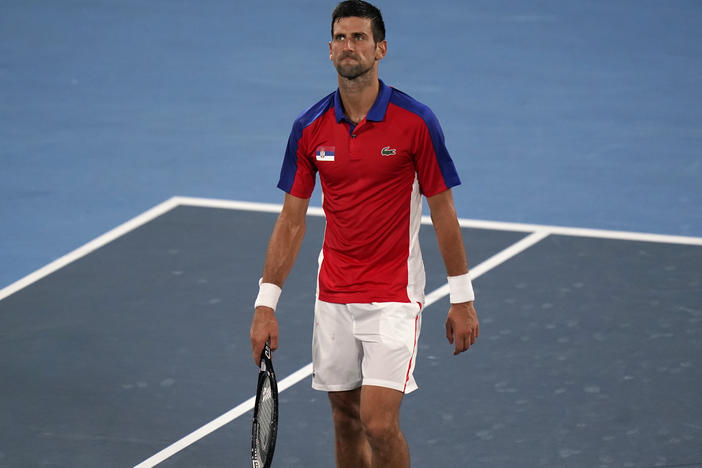 Serbia's Novak Djokovic reacts after he was defeated by Germany's Alexander Zverev during a semifinal match of the tennis competition on Friday at the Summer Olympics.