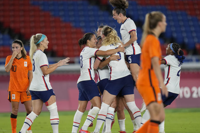 U.S. players celebrate a goal scored by teammate Lynn Williams during a women's quarterfinal soccer match against The Netherlands on Friday at the Summer Olympics in Yokohama, Japan.