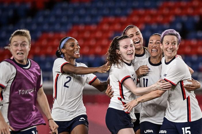 The U.S. team celebrates after winning the Tokyo 2020 Olympic Games women's quarter-final soccer match between Netherlands and the U.S. on July 30, 2021.