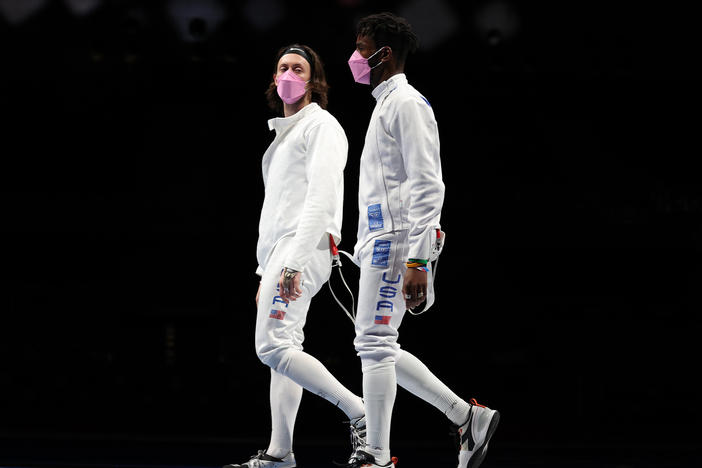 The "performative activism" by Americans Jacob Hoyle and Curtis McDowald on Friday was the latest criticism over allowing a man accused of sexual assault to attend the Olympics.