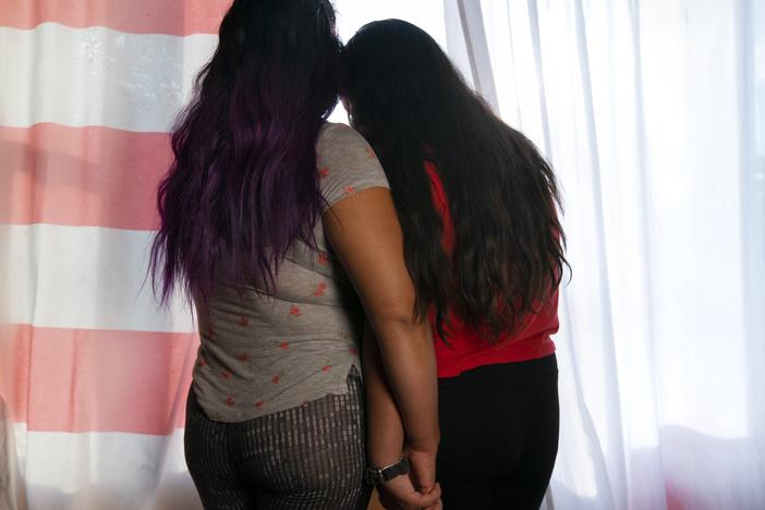 Jacqueline Flores (left) with daughter Nicky at their home in Virginia last month. They are part of the Asylum Seeker Advocacy Project, a group calling for an end to Title 42 so their family members can seek asylum.