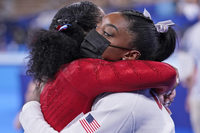 Simone Biles embraces teammate Jordan Chiles after she exited the team final at the Summer Olympics in Tokyo.