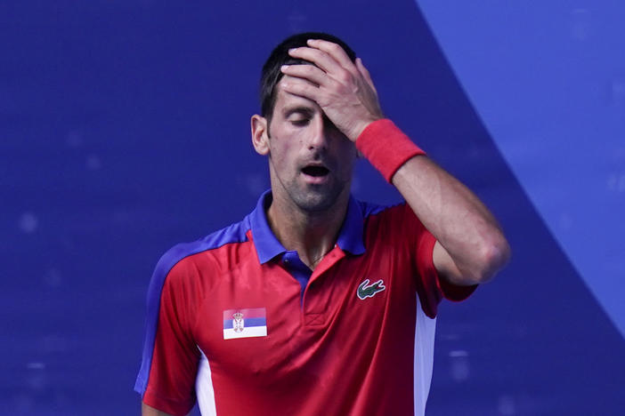 Novak Djokovic of Serbia reacts during the bronze medal match that he lost to Spain's Pablo Carreño Busta at the Tokyo Olympics on Saturday.