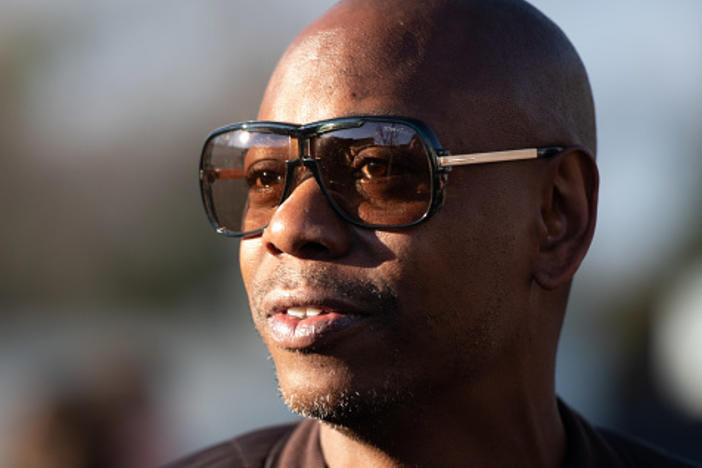 <em>Dave Chappelle: This Time This Place</em> chronicles Chappelle's efforts to entertain audiences during the pandemic with a series of outdoor shows. He's pictured above in North Charleston, S.C., on Jan. 30, 2020.