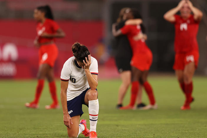 Carli Lloyd of the U.S. women's soccer team looks dejected after Monday's defeat in the semifinal match against Canada at the Tokyo Olympics.